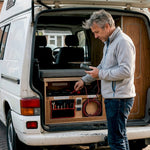 Campervan owner checking electrical setup