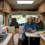 Couple reviewing motorhome solar power stats
