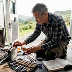 Campervan battery system being inspected