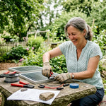 Woman assembling solar panels outdoors